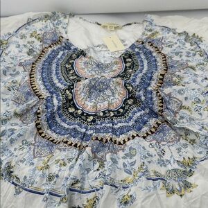 Elegant Blue and White Patterned Blouse